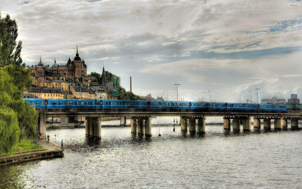 Scenic Railway Bridge Wallpaper: Stockholm's Historic Beauty