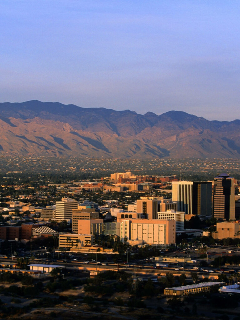Scenic Tucson Skyline & Mountains Wallpaper - Serene Blue Sky