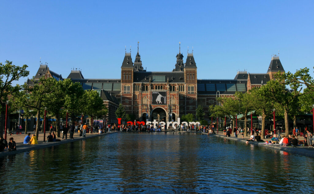 Vibrant Outdoor Scene Wallpaper: People by Rijksmuseum Reflections
