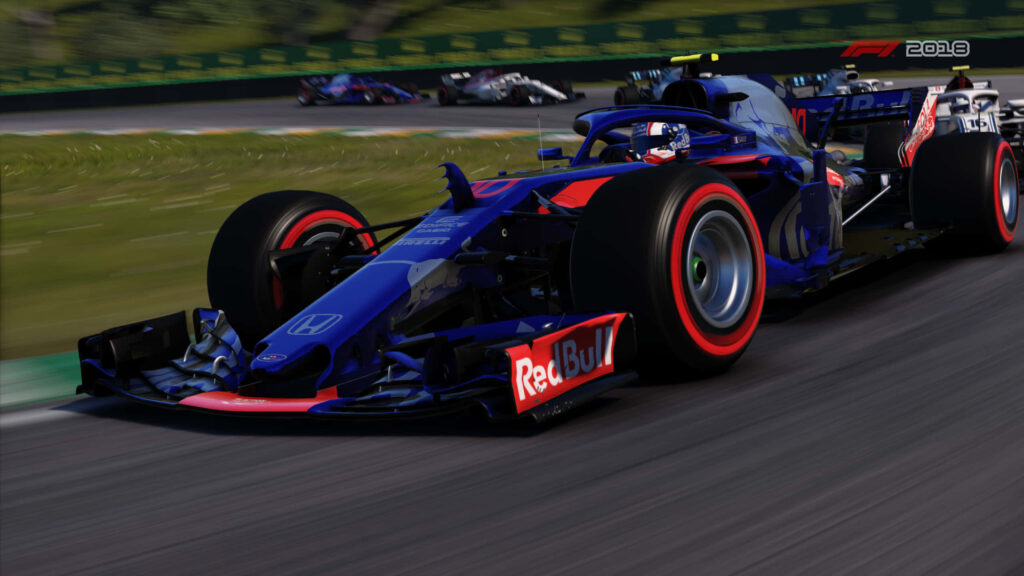 Scuderia Toro Rosso STR13 F1 car racing 2018 season vivid Red Bull colors dynamic speed wallpaper