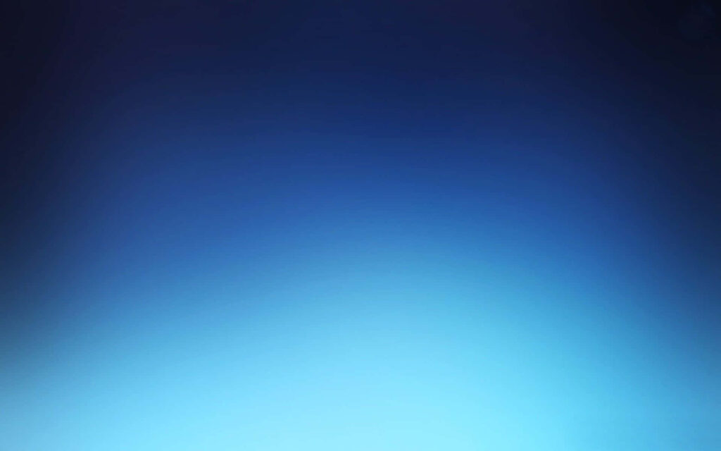 Minimalist digital wallpaper with smooth navy to light blue gradient for desktop background