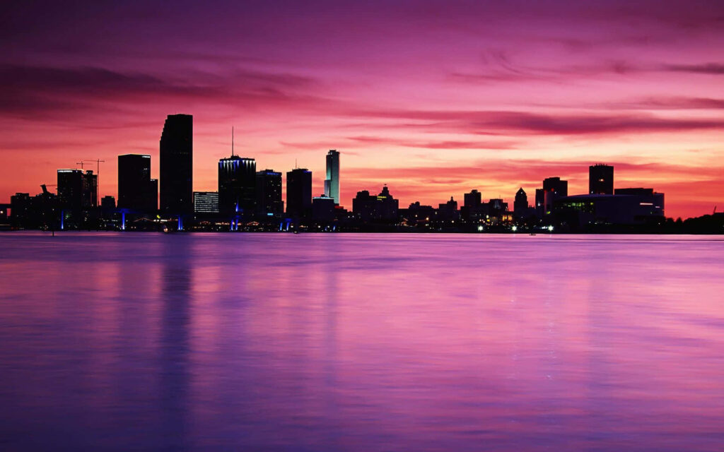 Stunning Pink City Skyline Wallpaper with Serene Waterfront & Sunset Glow