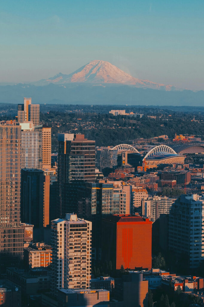 Stunning Seattle Cityscape Wallpaper with Mount Rainier & Blue Sky