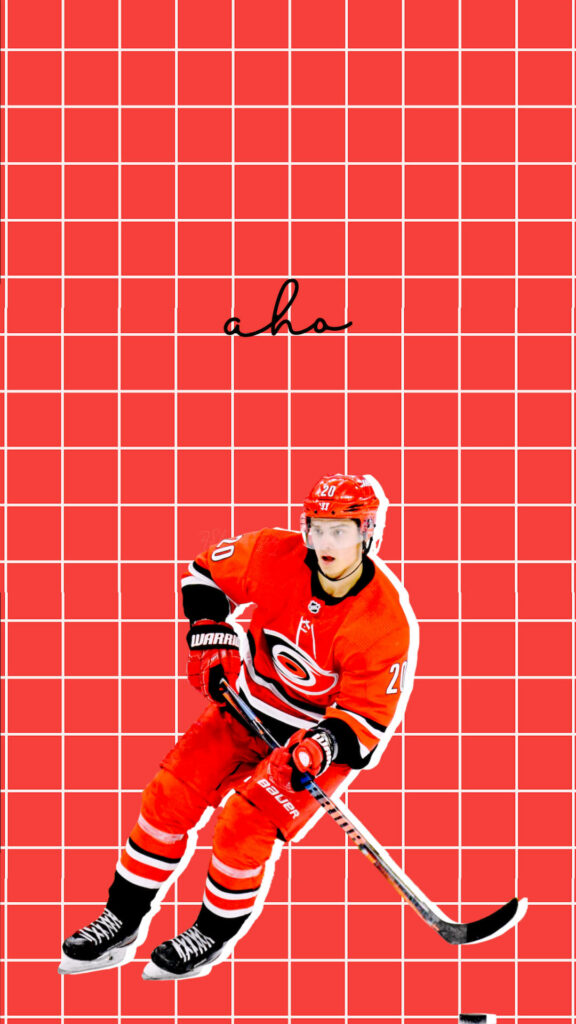 Sebastian Aho Carolina Hurricanes hockey player in red uniform on vibrant red grid wallpaper background