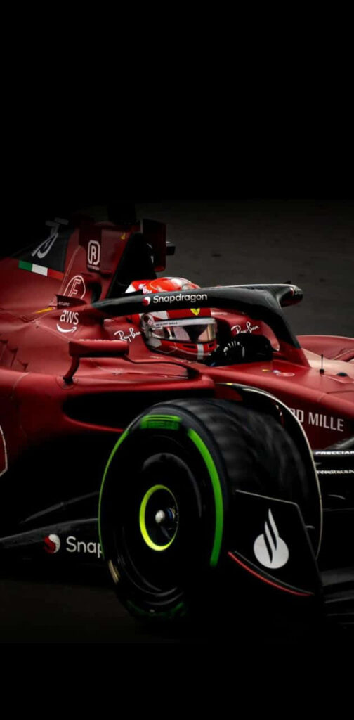 Determined Sebastian Vettel Reigns Supreme in Ferrari's Fierce Pursuit of Grand Prix Glory Wallpaper