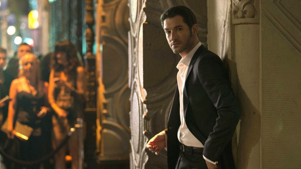 The Dapper Devil: Tom Ellis as Lucifer Morningstar in Striking Wallpaper
