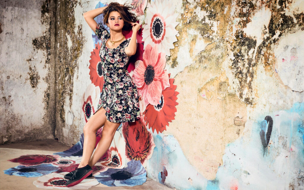 Selena Gomez in Chic Floral Outfit: Elegant Wallpaper Background