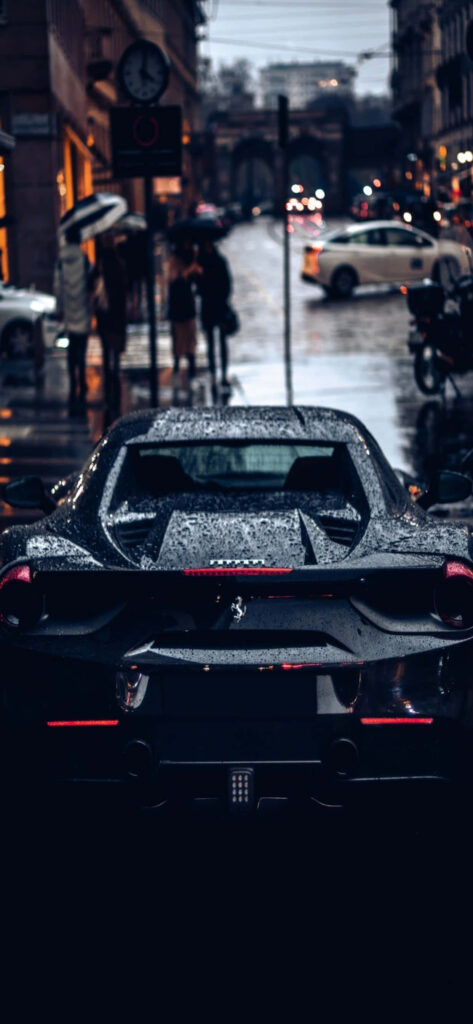 Captivating Snapshot: Exquisite Black Ferrari Steals the Spotlight against Max Ferrari Background Wallpaper