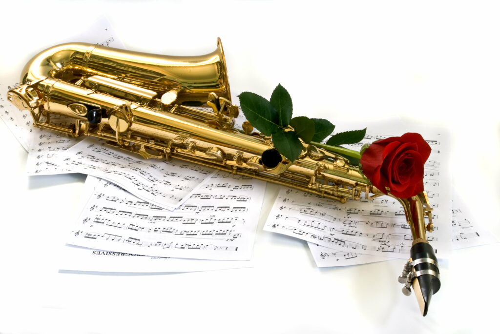 Saxophone Serenade: Captivating Harmony in a Romantic Rose Garden Wallpaper