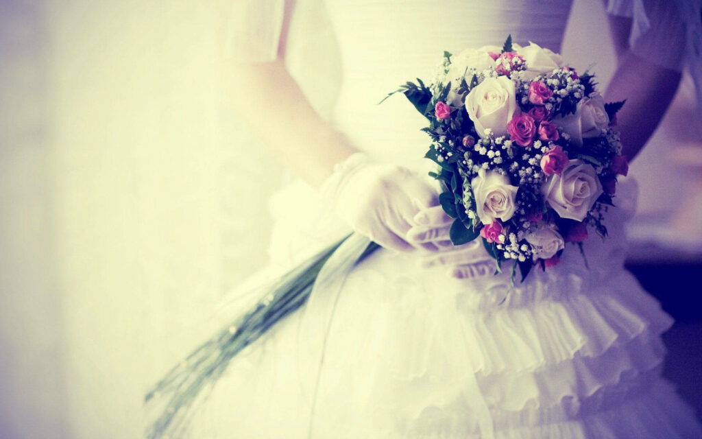 Ethereal Nostalgia: A Dreamy Bridal Portrait amidst Vintage Sepia Tones Wallpaper