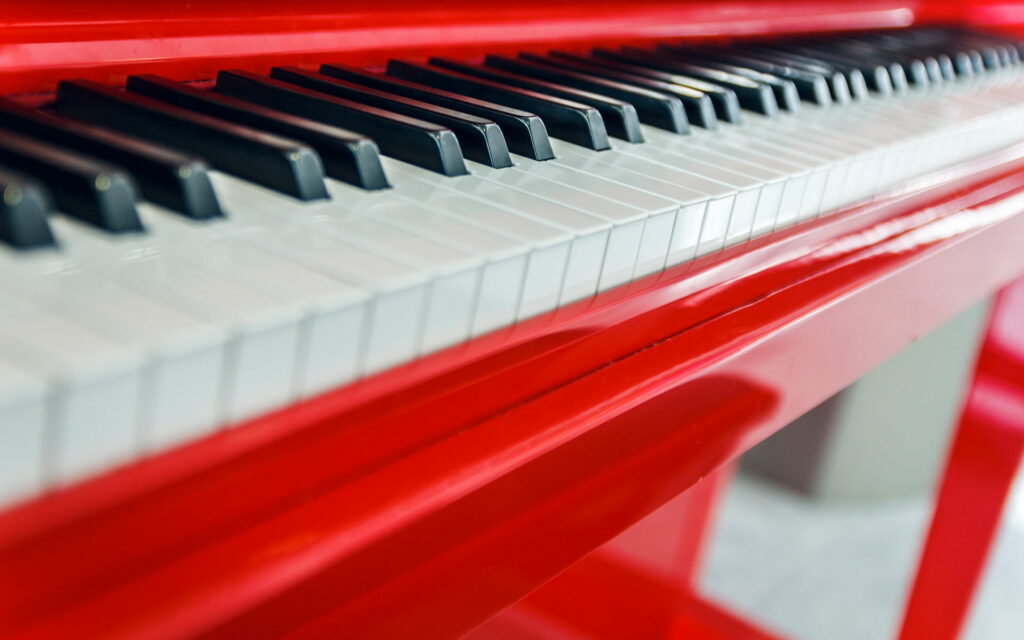 Crimson Harmony: A Captivating Snapshot of Piano Euphony Wallpaper