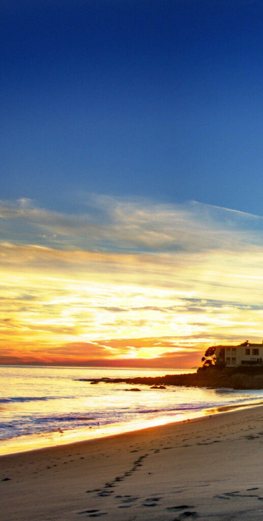 Paradise on Your Home Screen: Captivating Malibu Sunset Sky as Iphone Wallpaper