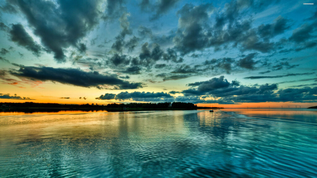 Serene 4K Beach Wallpaper: Tranquil Sky & Calm Waters Background