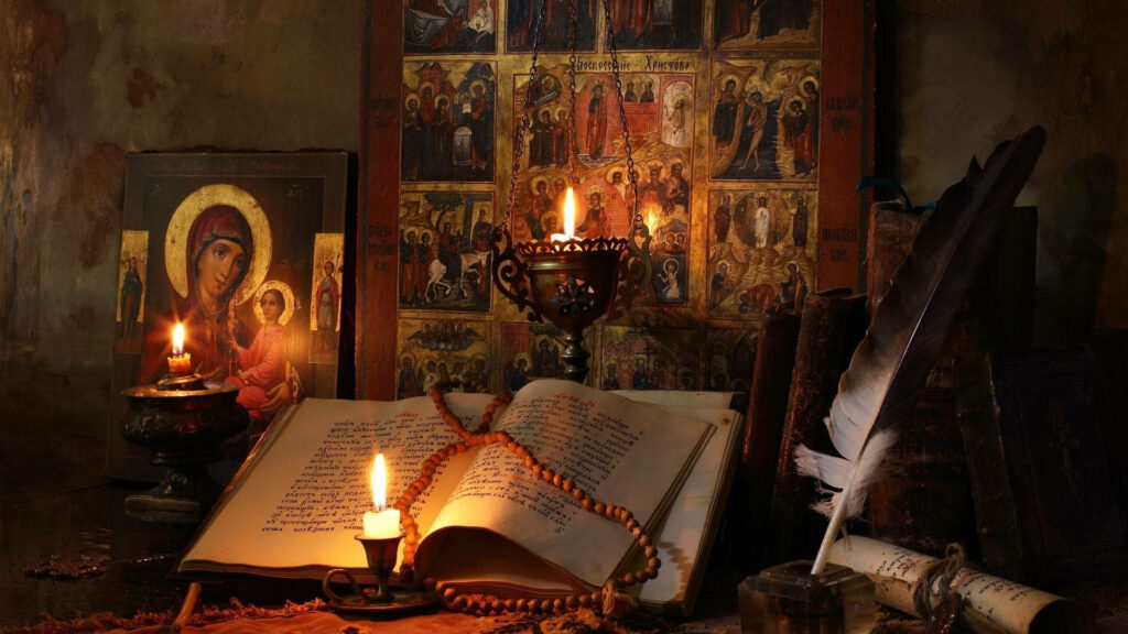 Serene altar with candles icons open handwritten book quill prayer beads ancient scrolls wallpaper