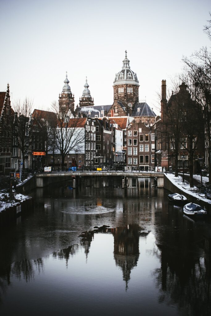 Serene Amsterdam Wallpaper: Iconic Architecture & Tranquil Canals
