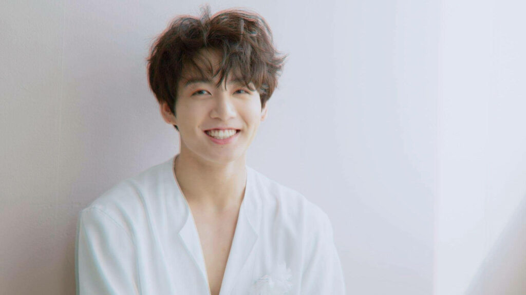 Jungkook's Charming Smile: Soft Minimalist Wallpaper Background