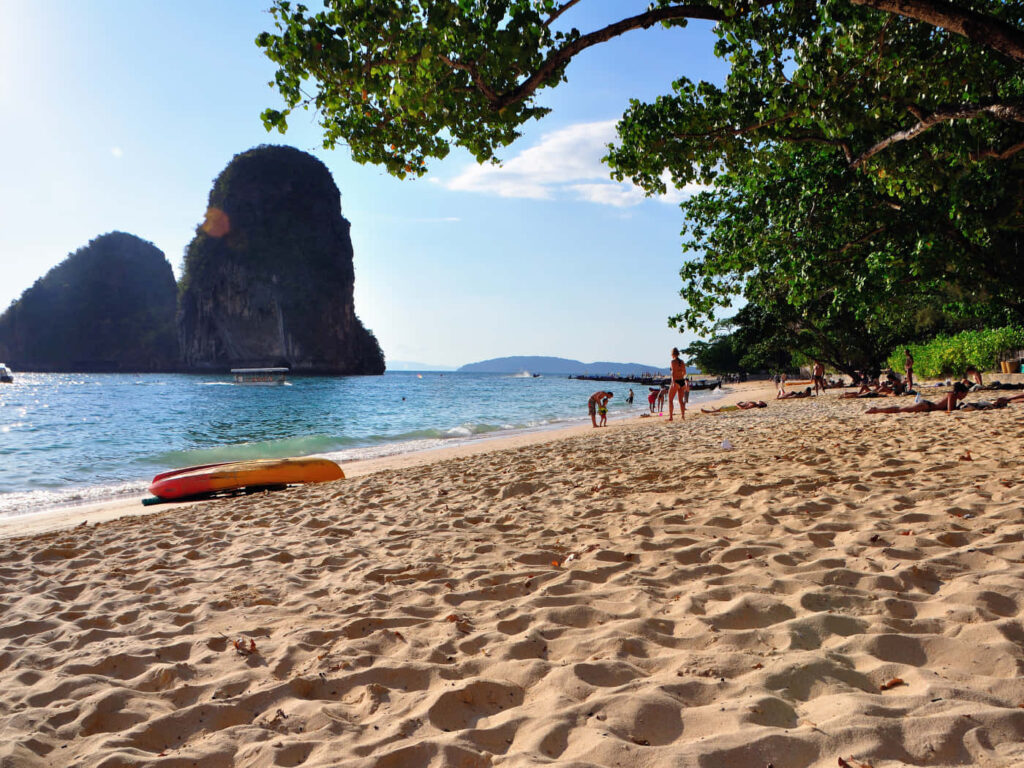 Serene Beach Scene Wallpaper: Golden Sand & Clear Blue Water