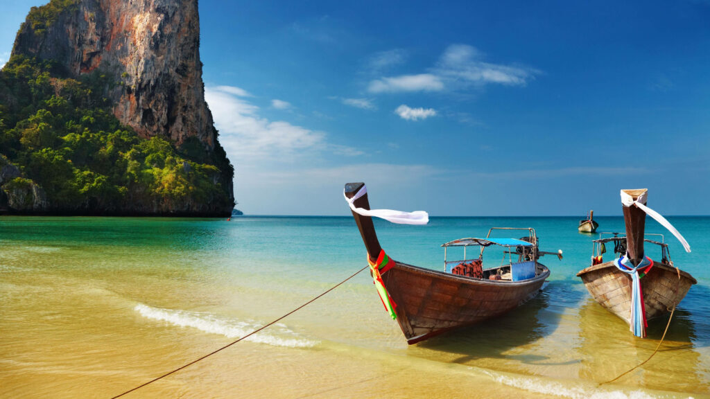 Serene Beach with Longtail Boats: Tropical Desktop Wallpaper