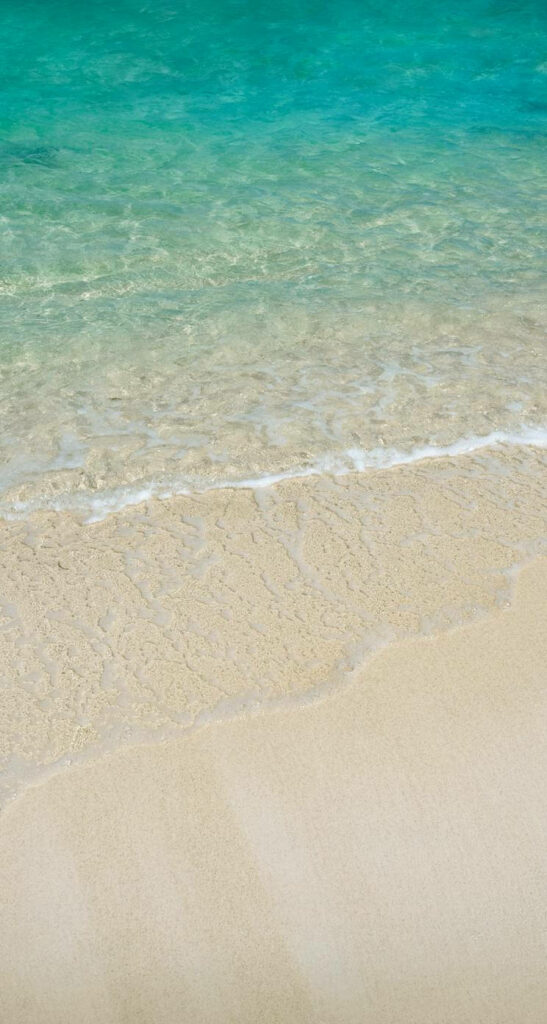 Tropical Paradise Wallpaper: Serene Beach with Turquoise Waters