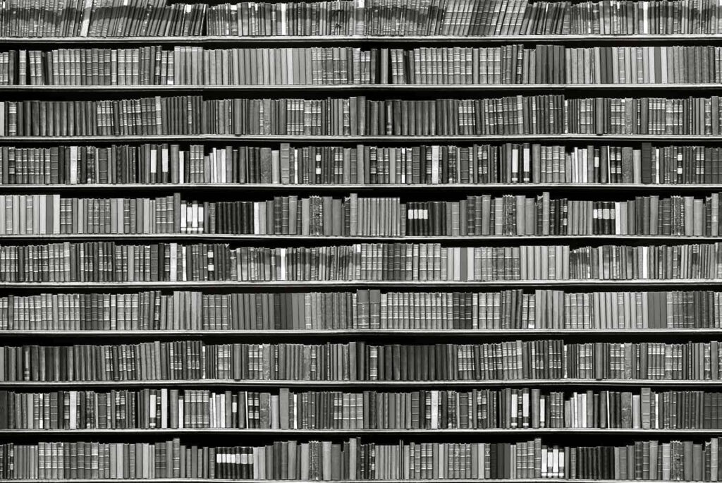 Black and White Library Wallpaper: Serene Book-filled Background