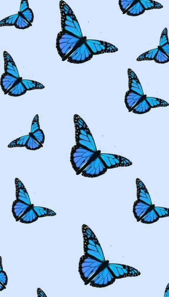 Serene Blue Butterflies Wallpaper: Captivating Fluttering Pattern