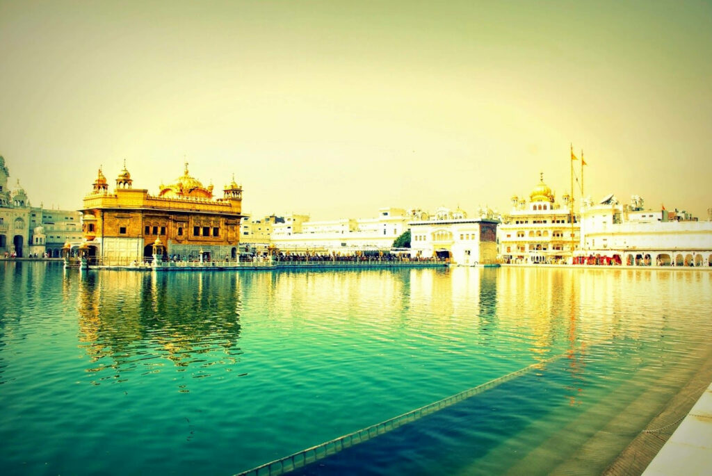Stunning HD Wallpaper of Lake & Golden Temple - Tranquil Background