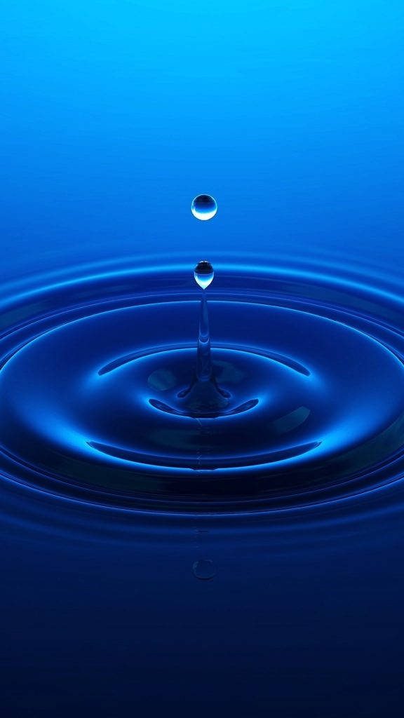 Macro water drop splash with glowing blue ripples on deep blue gradient iPhone wallpaper background