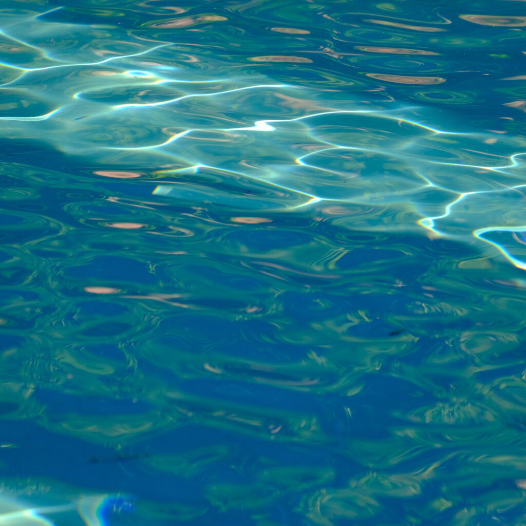 Serene Blue Wave Patterns Wallpaper | Macro Water Ripple Background
