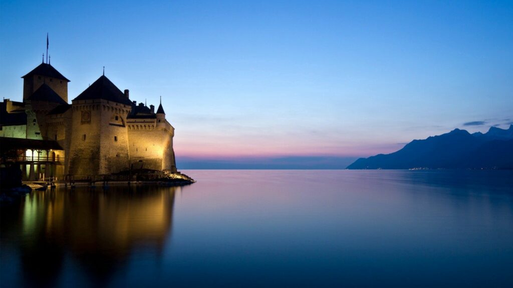 Serene Castle Nighttime Wallpaper: Twilight & Lake Reflections