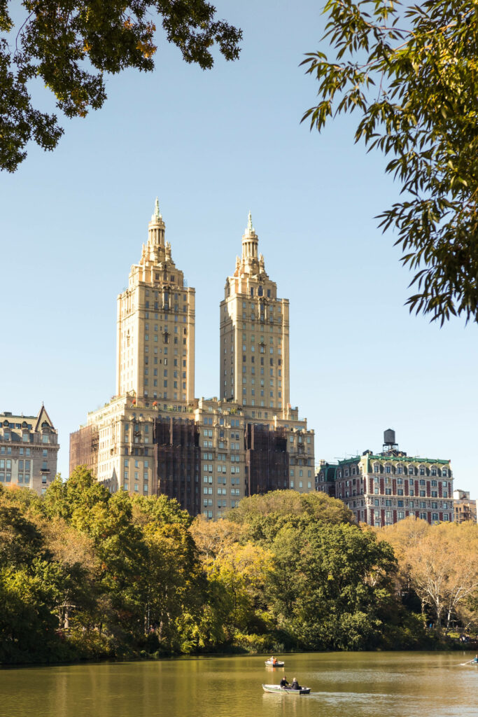Serene Central Park Lake Wallpaper with Lush Greenery & Skyline