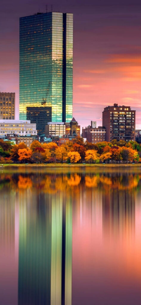 Serene Cityscape Wallpaper: Autumn Trees & Sunset Reflections