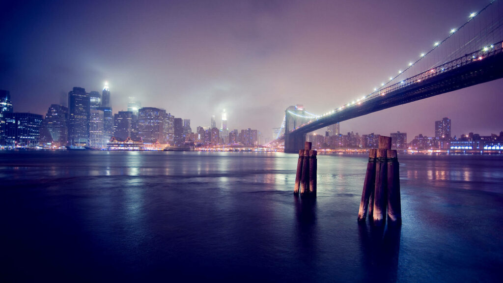 Serene Night Cityscape Wallpaper with Bridge & Calm Water Reflections