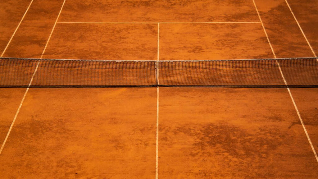 Minimalist Clay Tennis Court Wallpaper for Sport Enthusiasts
