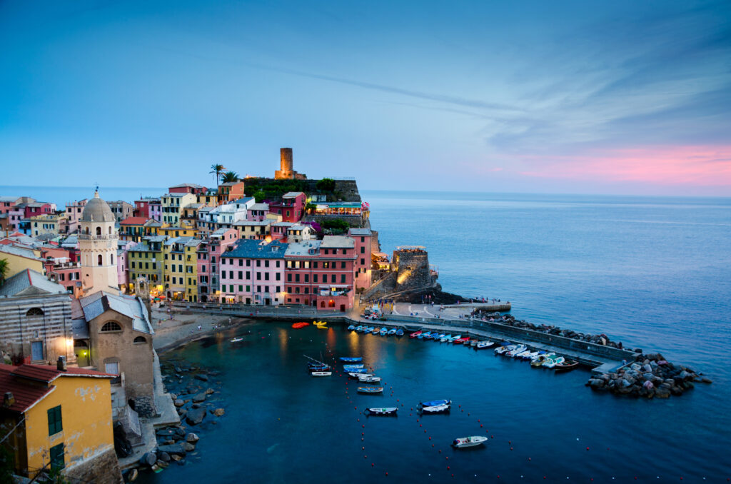 Twilight Coastal Village Wallpaper: Serene Pier & Colorful Houses
