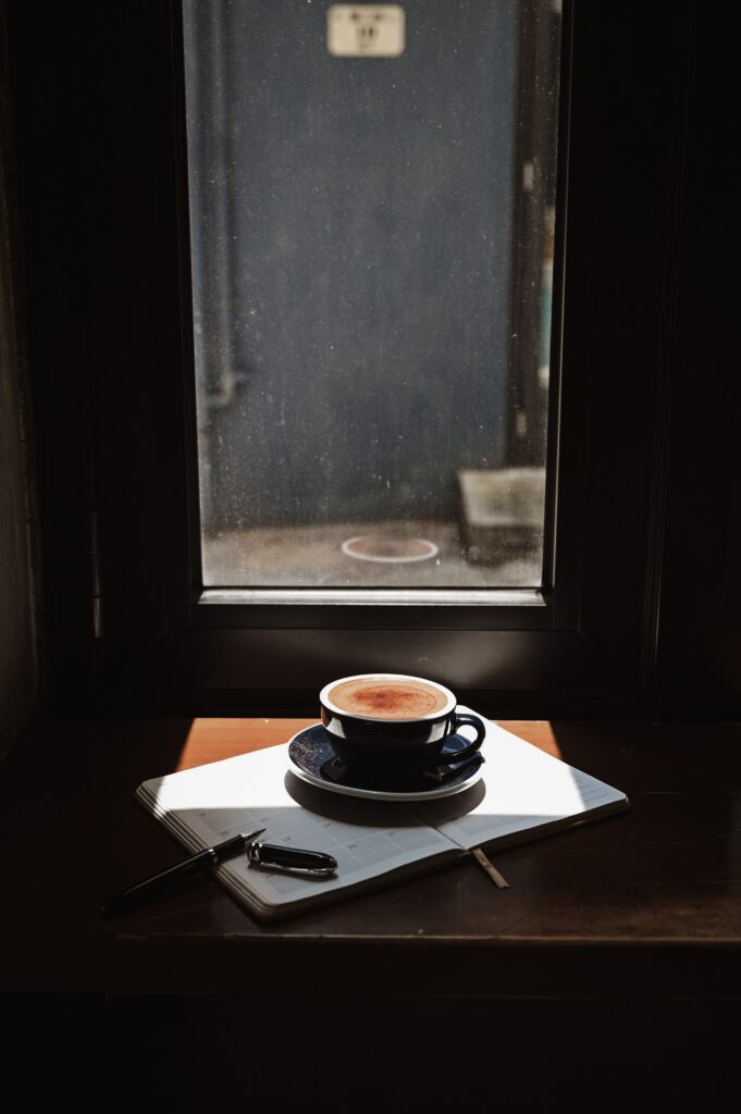 Cozy Coffee Wallpaper: Soft Light by the Windowsill