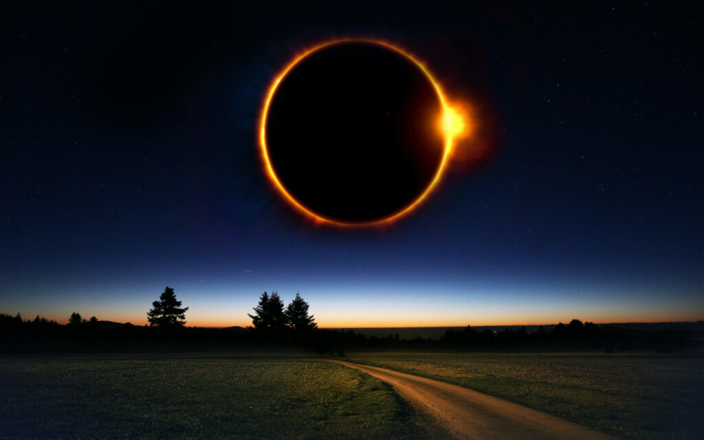 Serene Country Road Wallpaper: Solar Eclipse & Twilight Sky Beauty