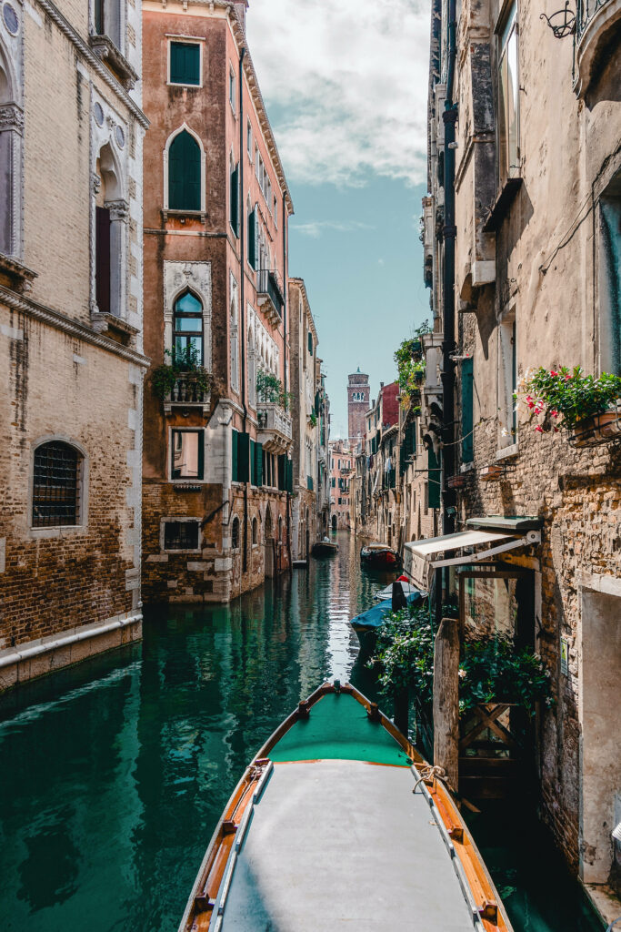 Serene Creek Wallpaper: Vibrant Waters & Historic Architecture