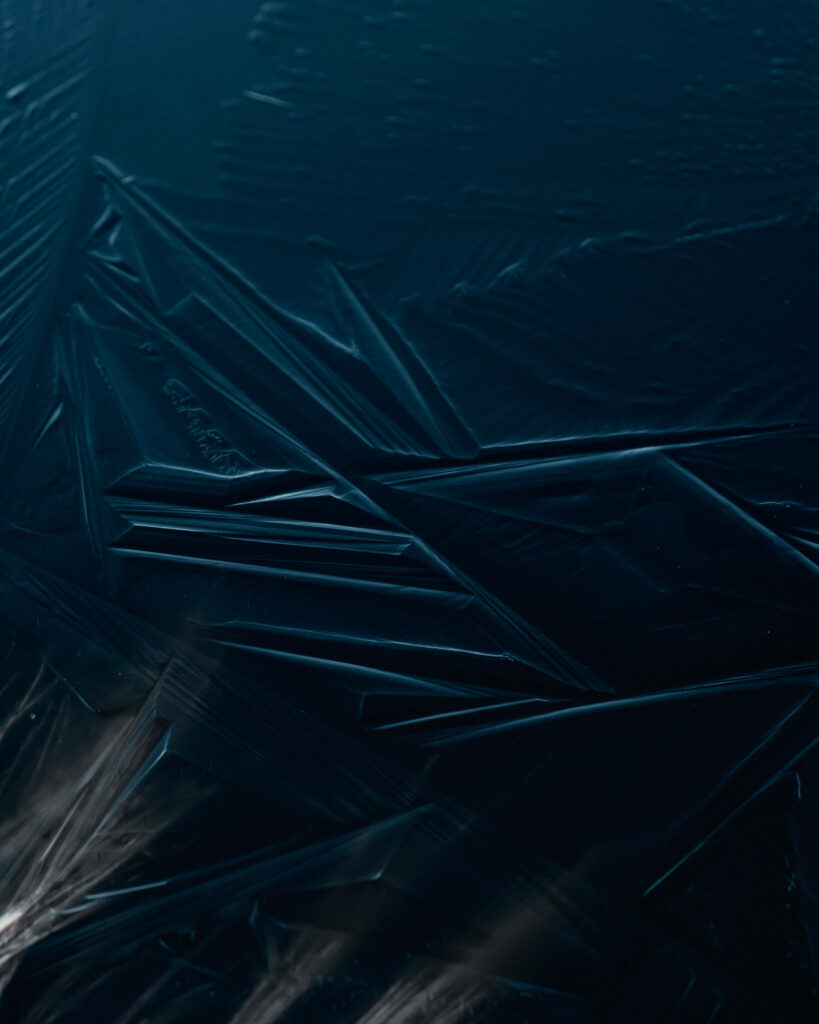 Serene Dark Blue Wallpaper: Intricate Frozen Lake Texture Patterns
