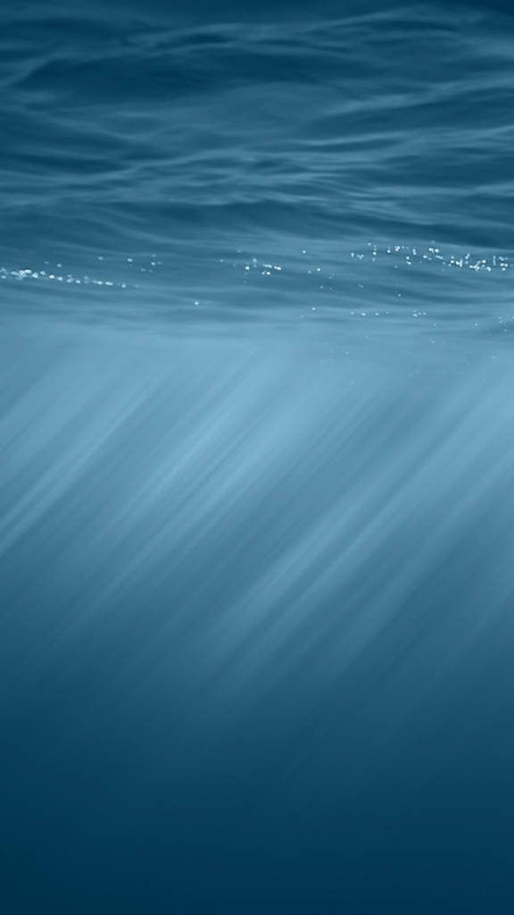 Minimalist iOS 7 wallpaper with deep blue water and serene light rays underwater view background