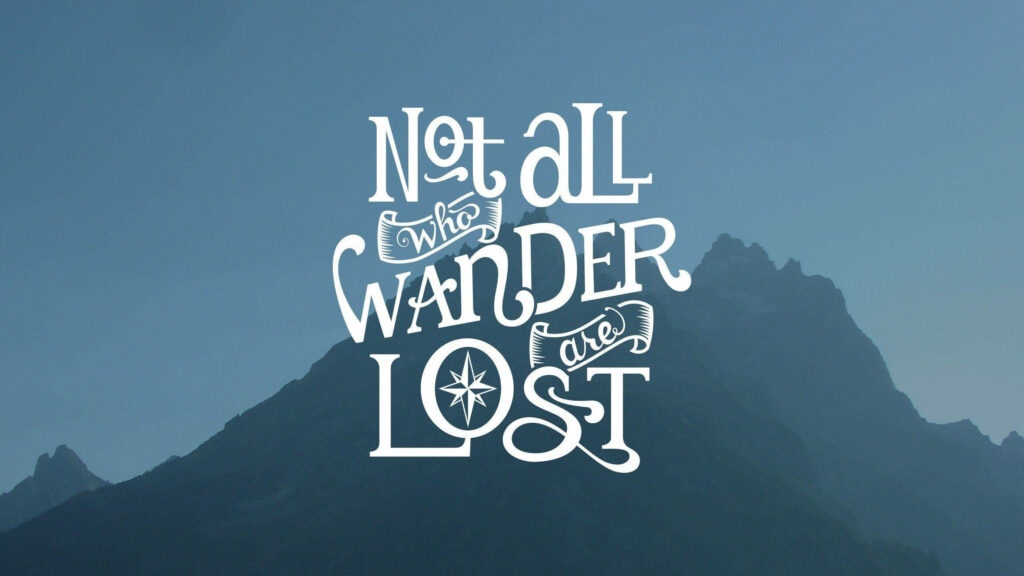Adventure Awaits: Serene Wallpaper with 'Not All Who Wander' Quote