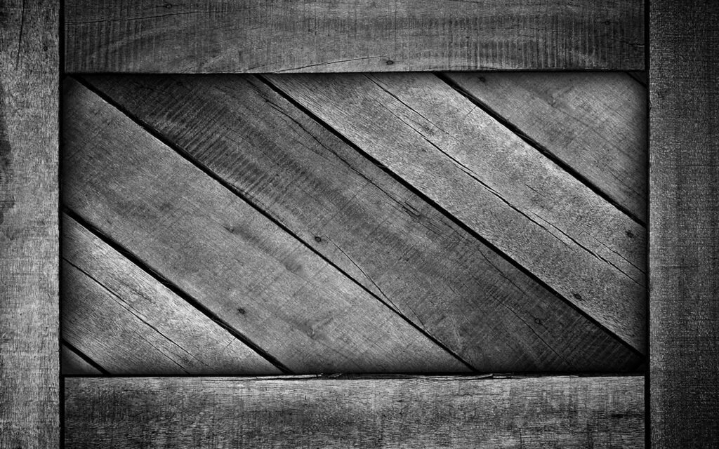 Rustic Serenity: Gray Wooden Frames Complementing Textured Background Wallpaper