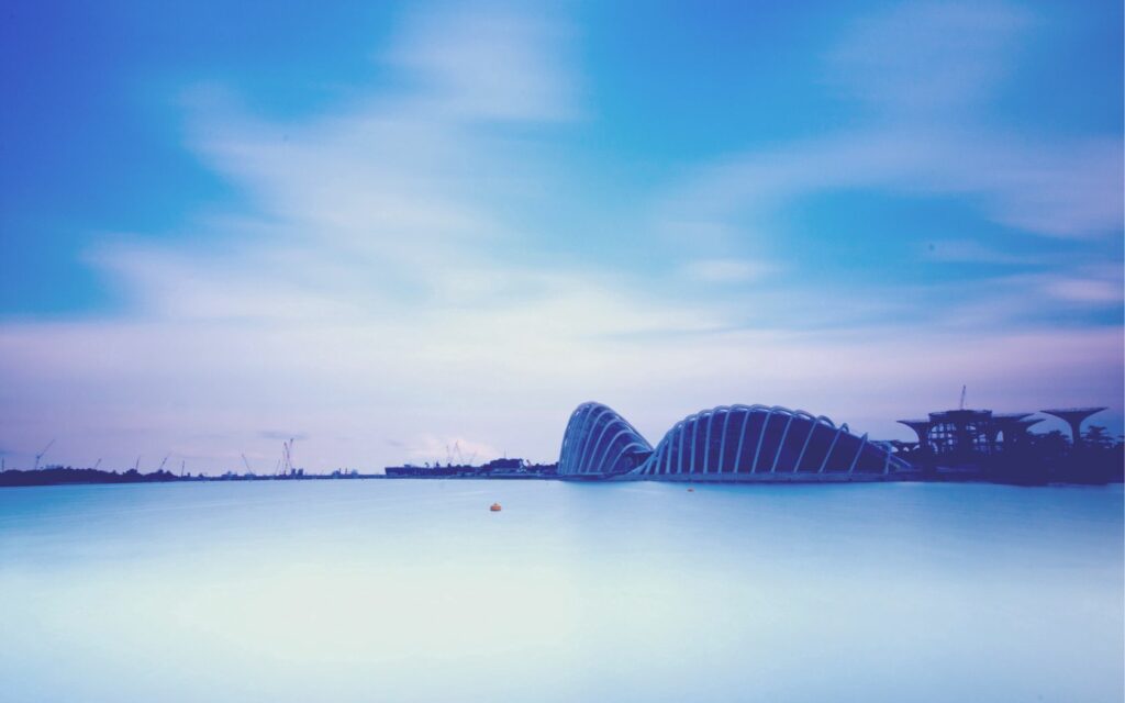Serene Evening Bay View: Modern Metropolis Wallpaper Background