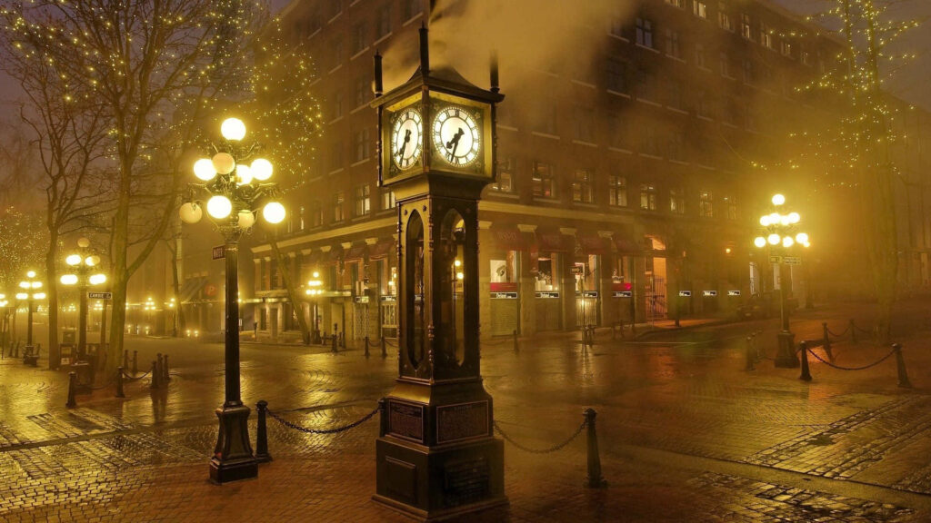 Enchanting Cityscape at Dusk: Historic Clock & Glowing Streetlights Wallpaper