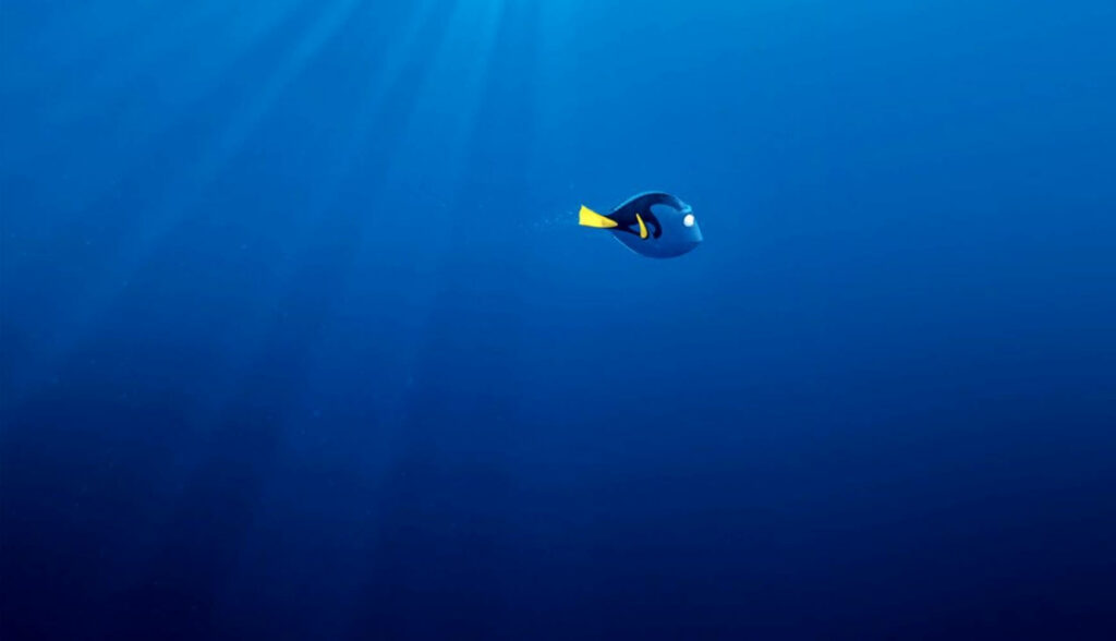 Tranquil Finding Dory Laptop Wallpaper: Graceful Underwater Scene