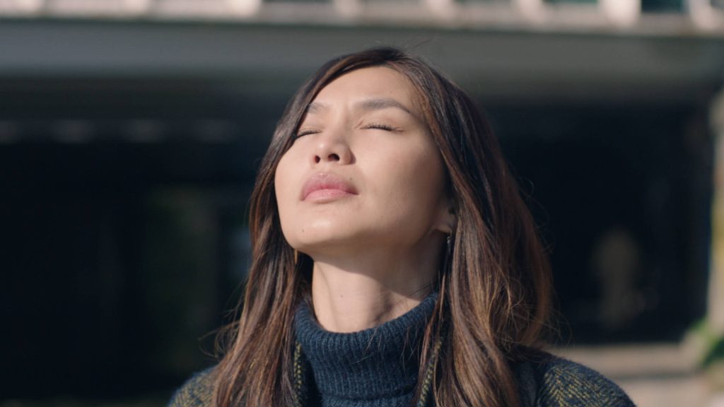 Gemma Chan close-up wallpaper serene calm natural sunlight reflective peaceful mood background