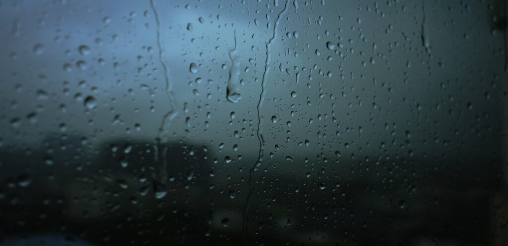 Serene Glass Surface Wallpaper with Moisture Drops - Blurred Effect
