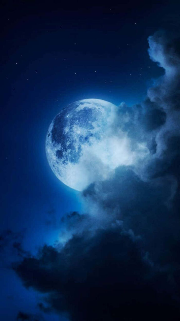 Serene Glowing Full Moon iPhone Wallpaper with Dramatic Clouds
