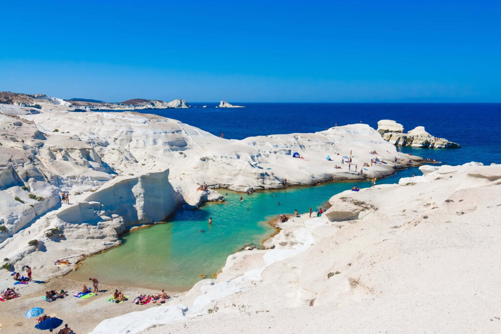 Serene Greek Beach Wallpaper: White Rocks & Turquoise Waters