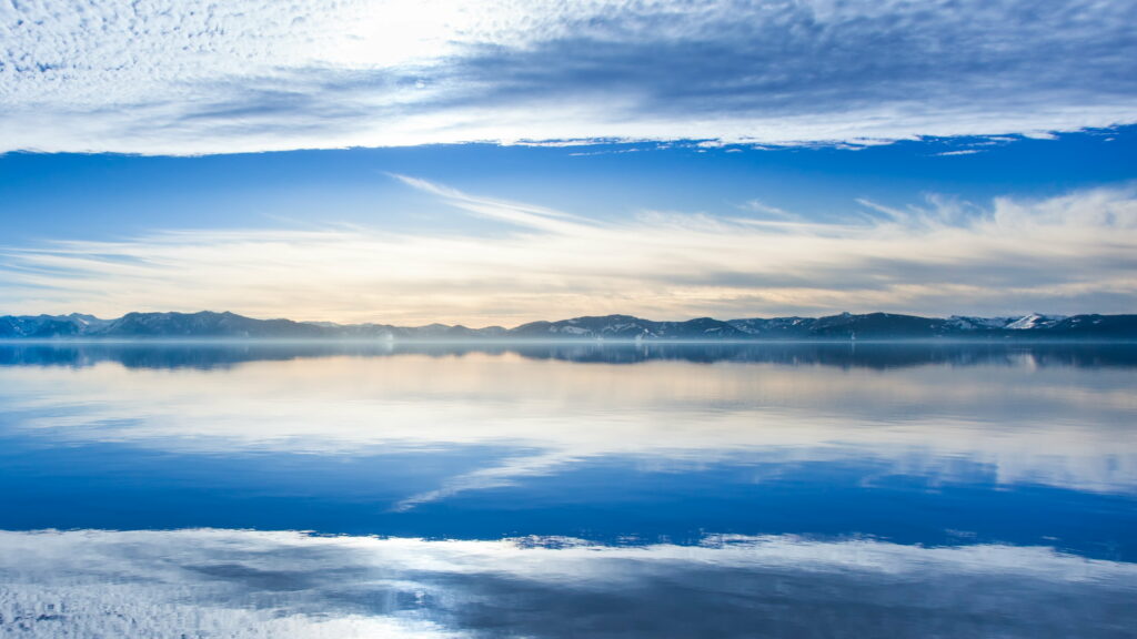 Serene HD Wallpaper: Calm Lake & Majestic Mountains Background