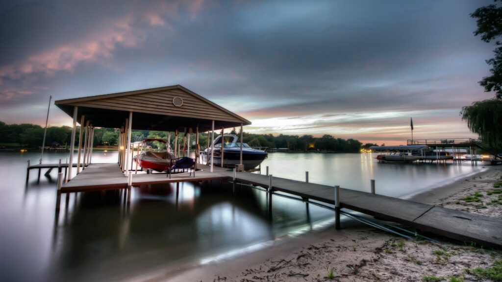 Tranquil Riverside HDR Wallpaper: Boats & Colorful Sunset Sky